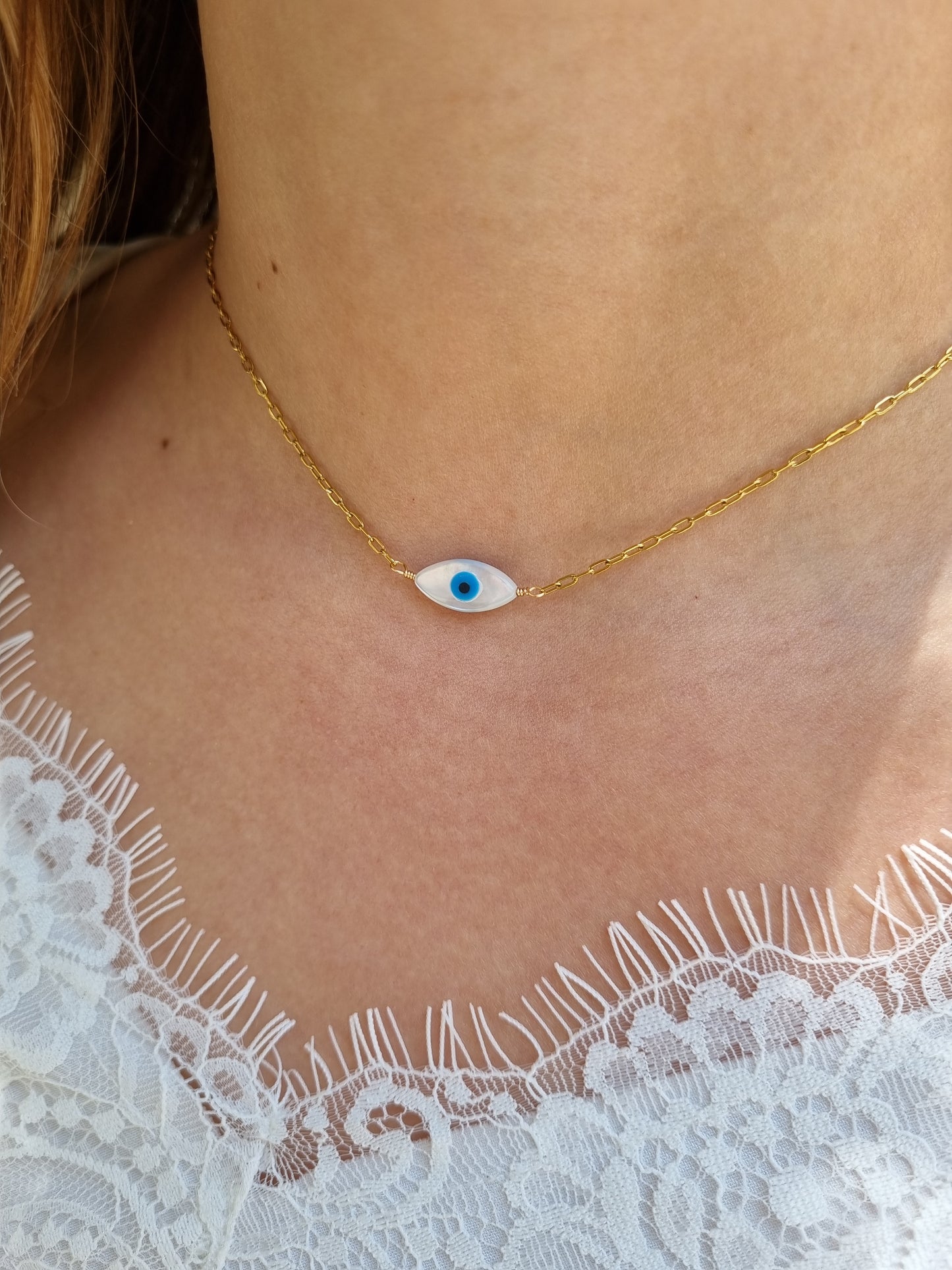 Collier oeil ovale nacré - doré