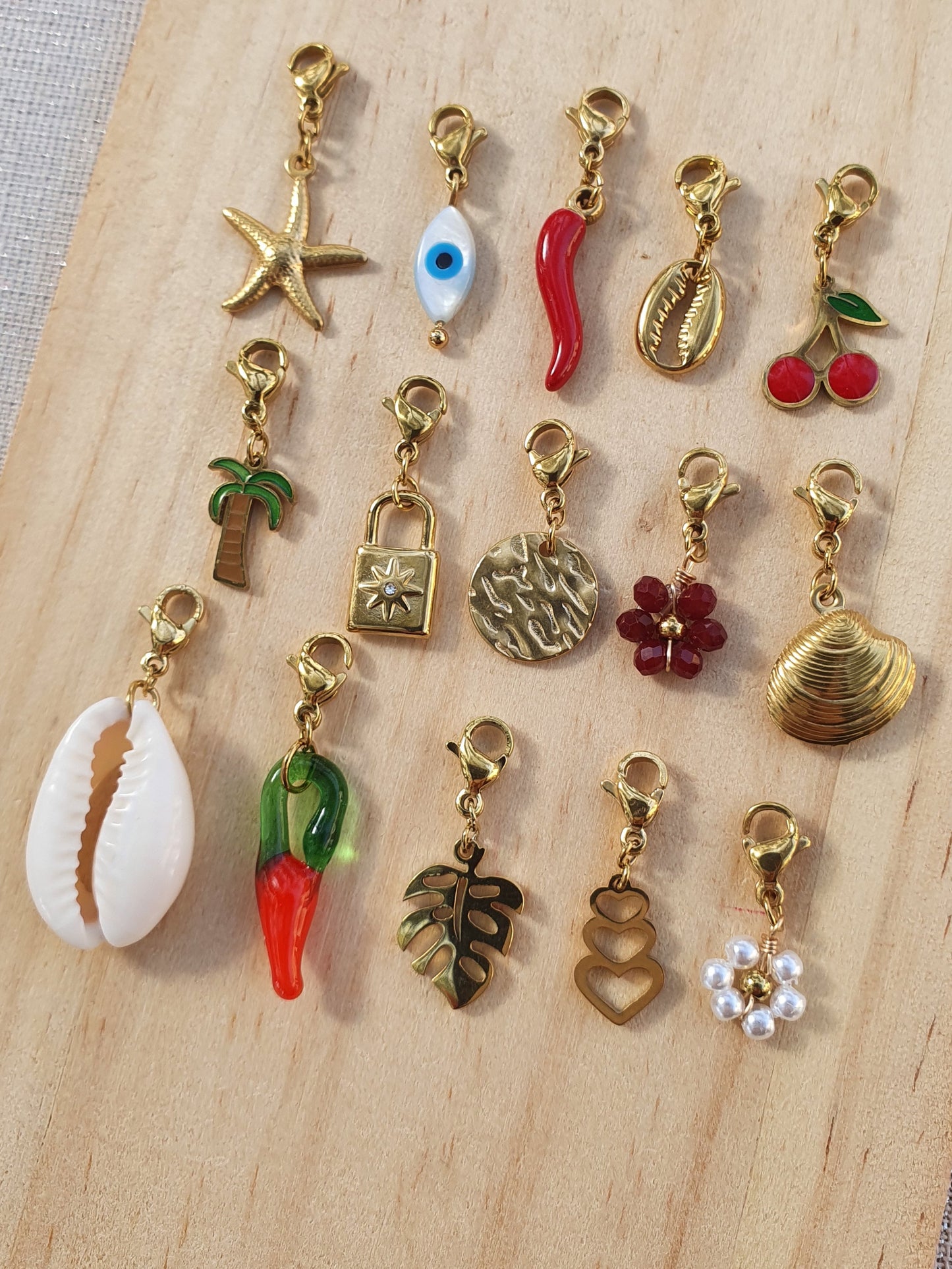 Charm coquillage coque - doré