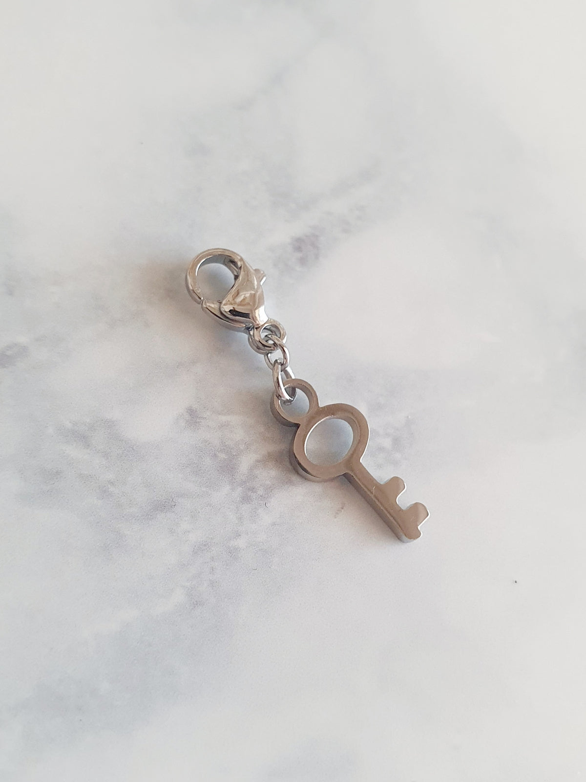 Charm clé ronde