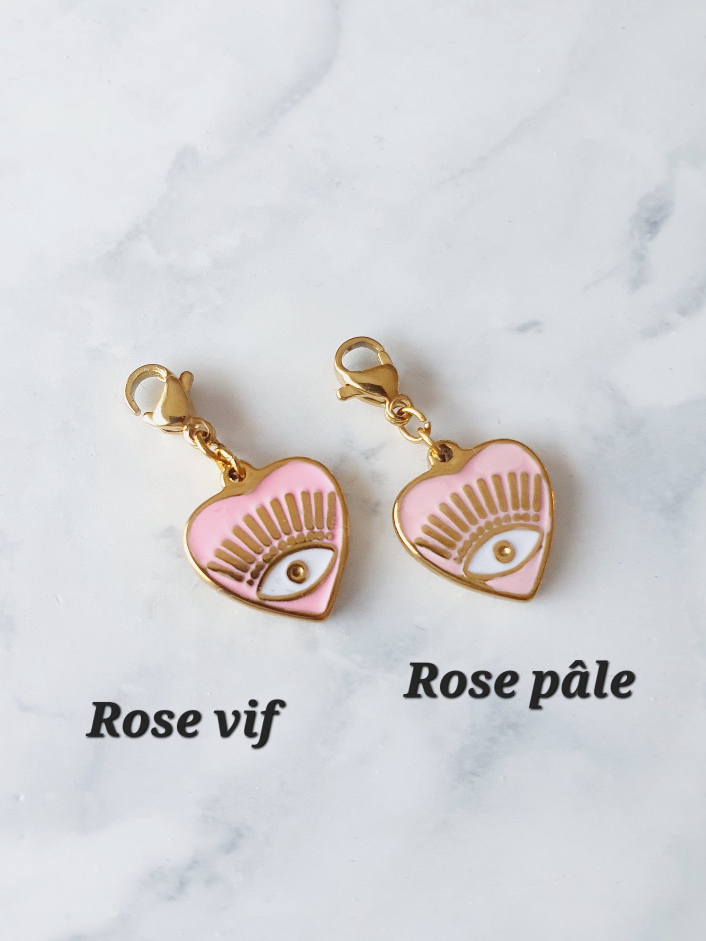 Charm coeur oeil rose pâle - doré