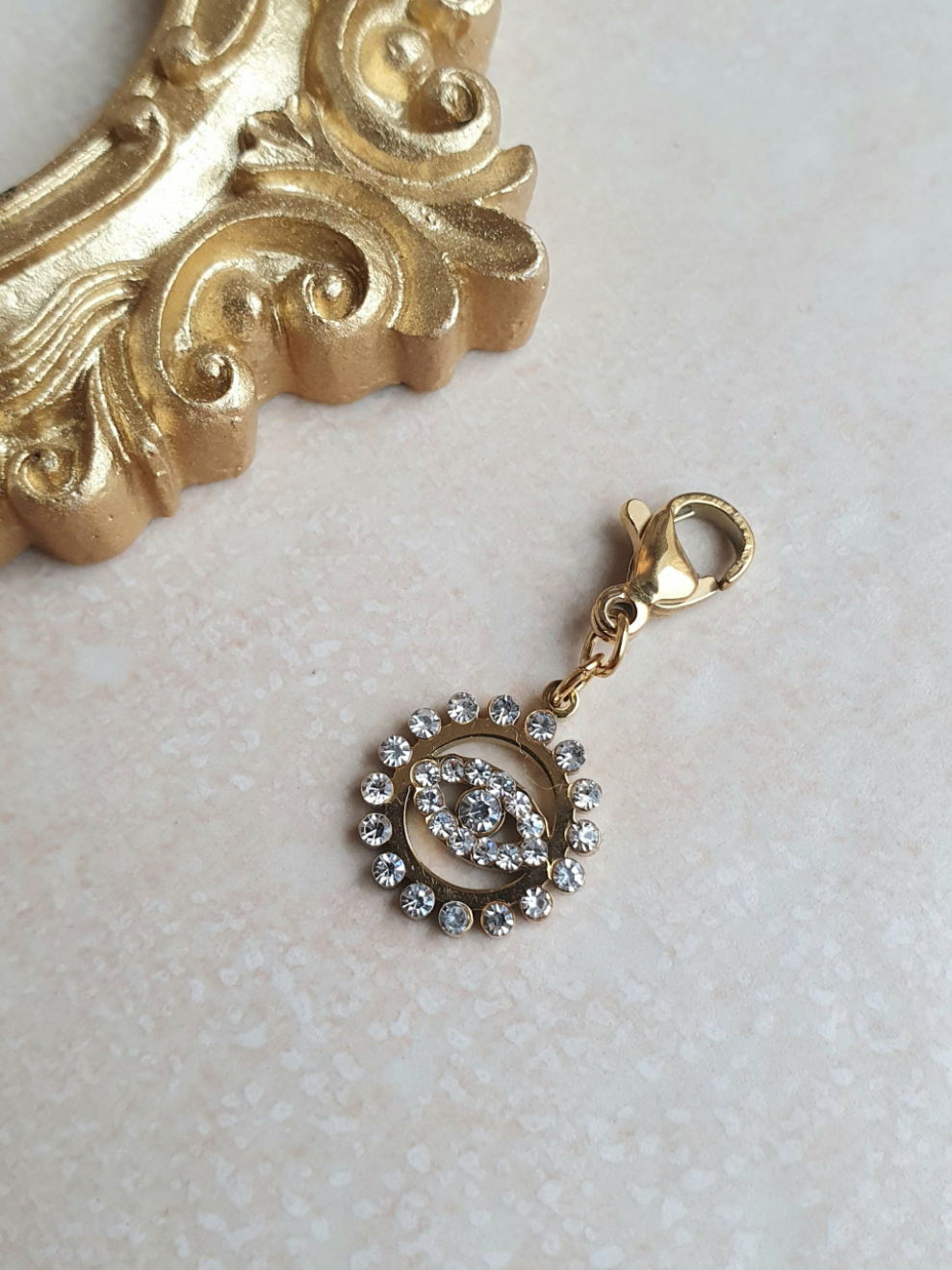 Charm oeil en zircons - doré