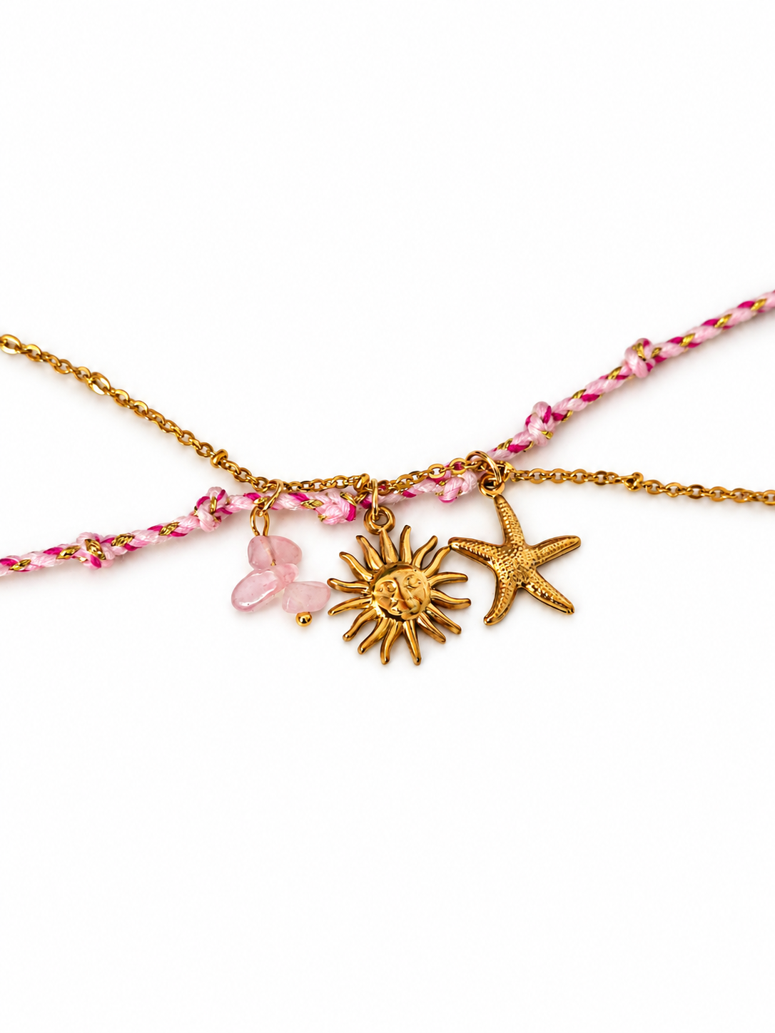 Bracelet cordon tressé rose et chaîne dorée avec breloques soleil, étoile de mer et quartz rose