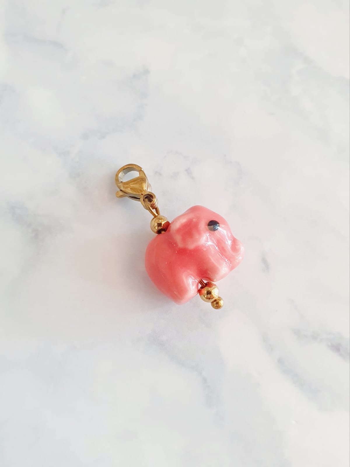 Charm baby éléphant - doré / rose