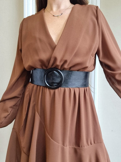 Ceinture luisante en cuir noir