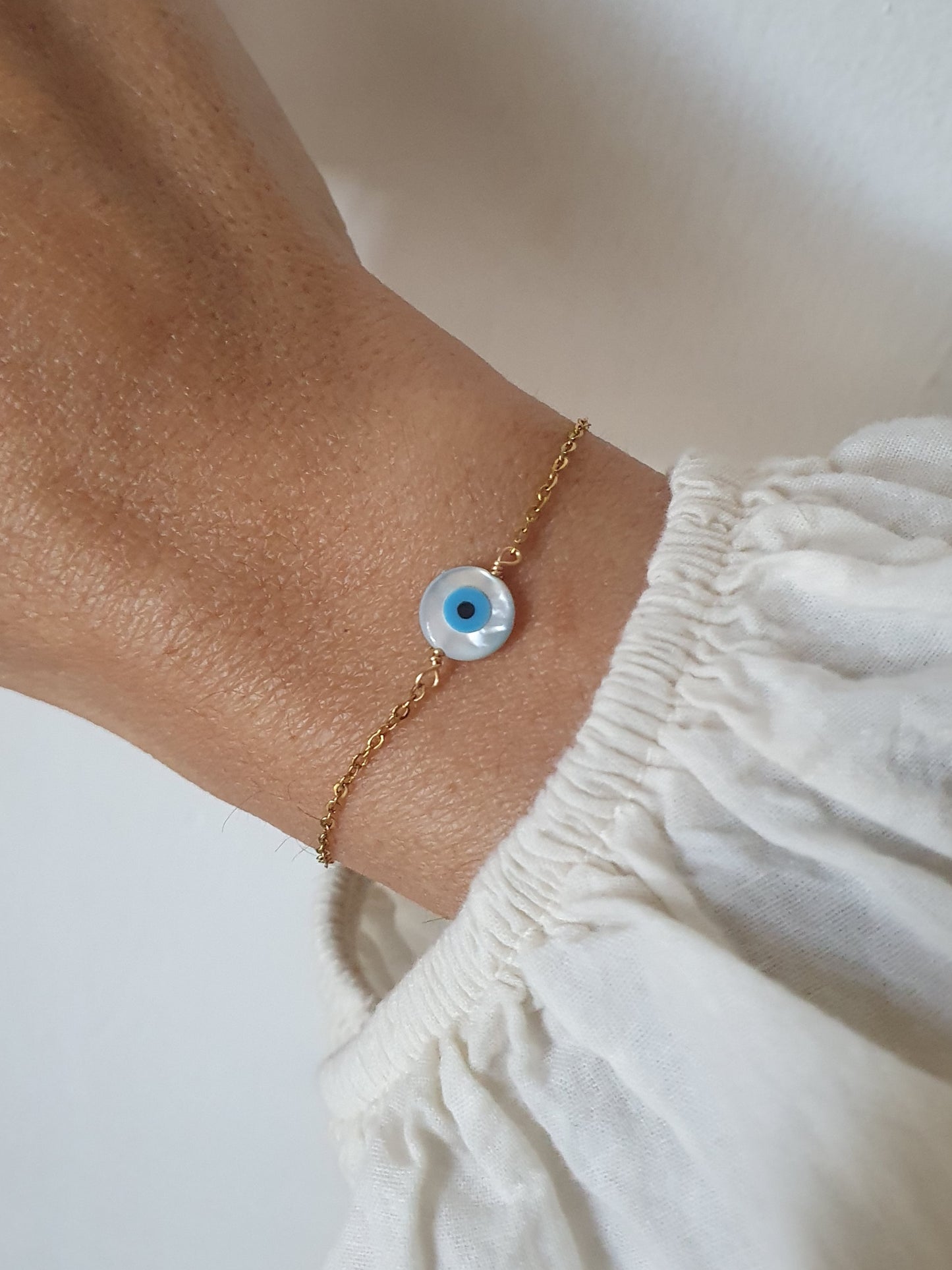 Bracelet oeil rond en nacre - doré