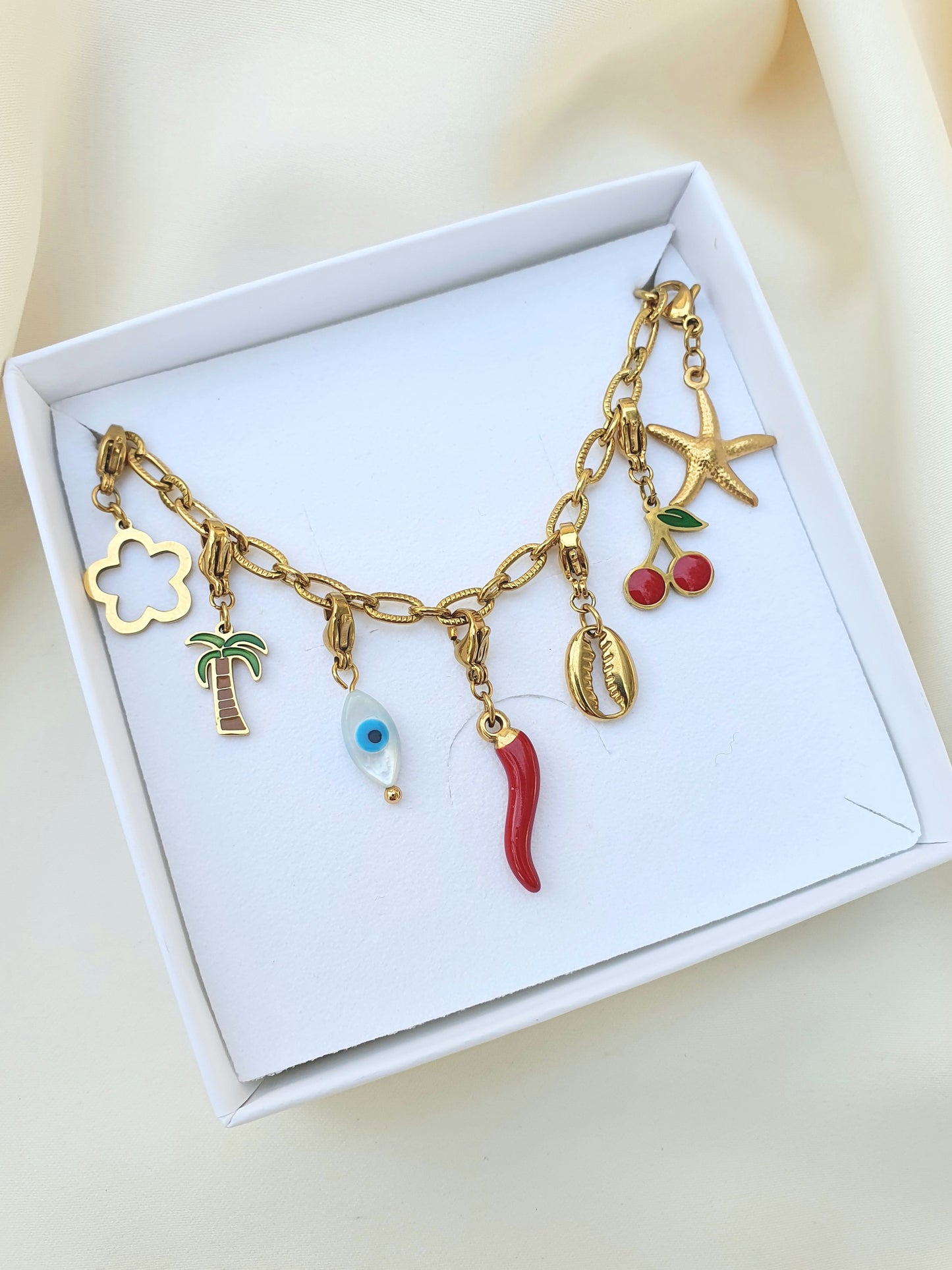 Charm coquillage cauri plat - doré