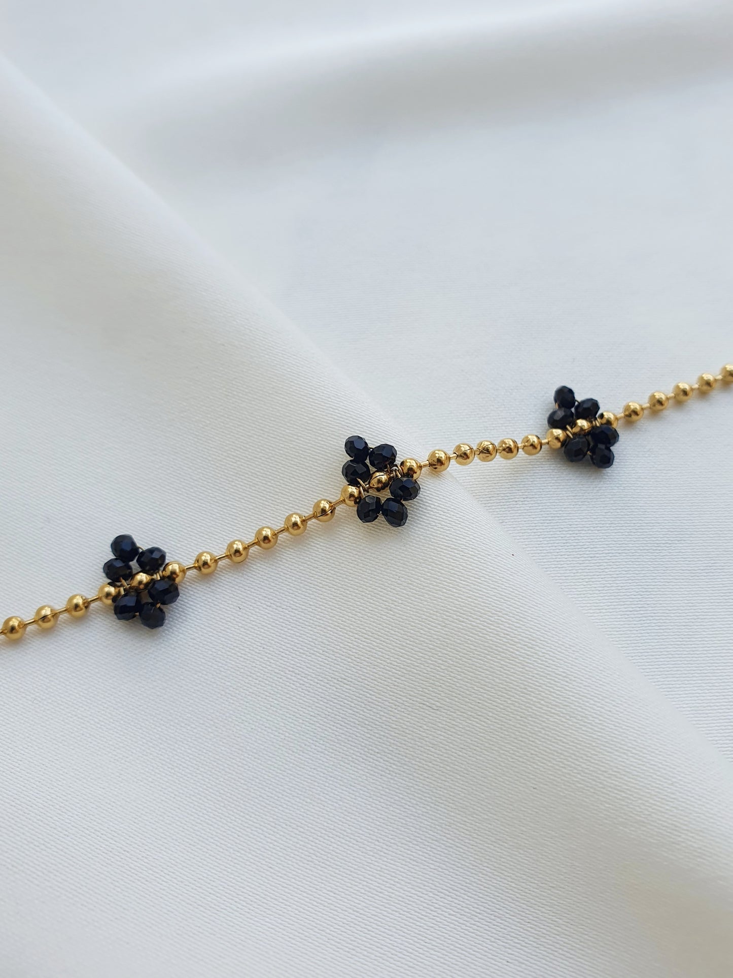 Bracelet fleurs perlées - doré