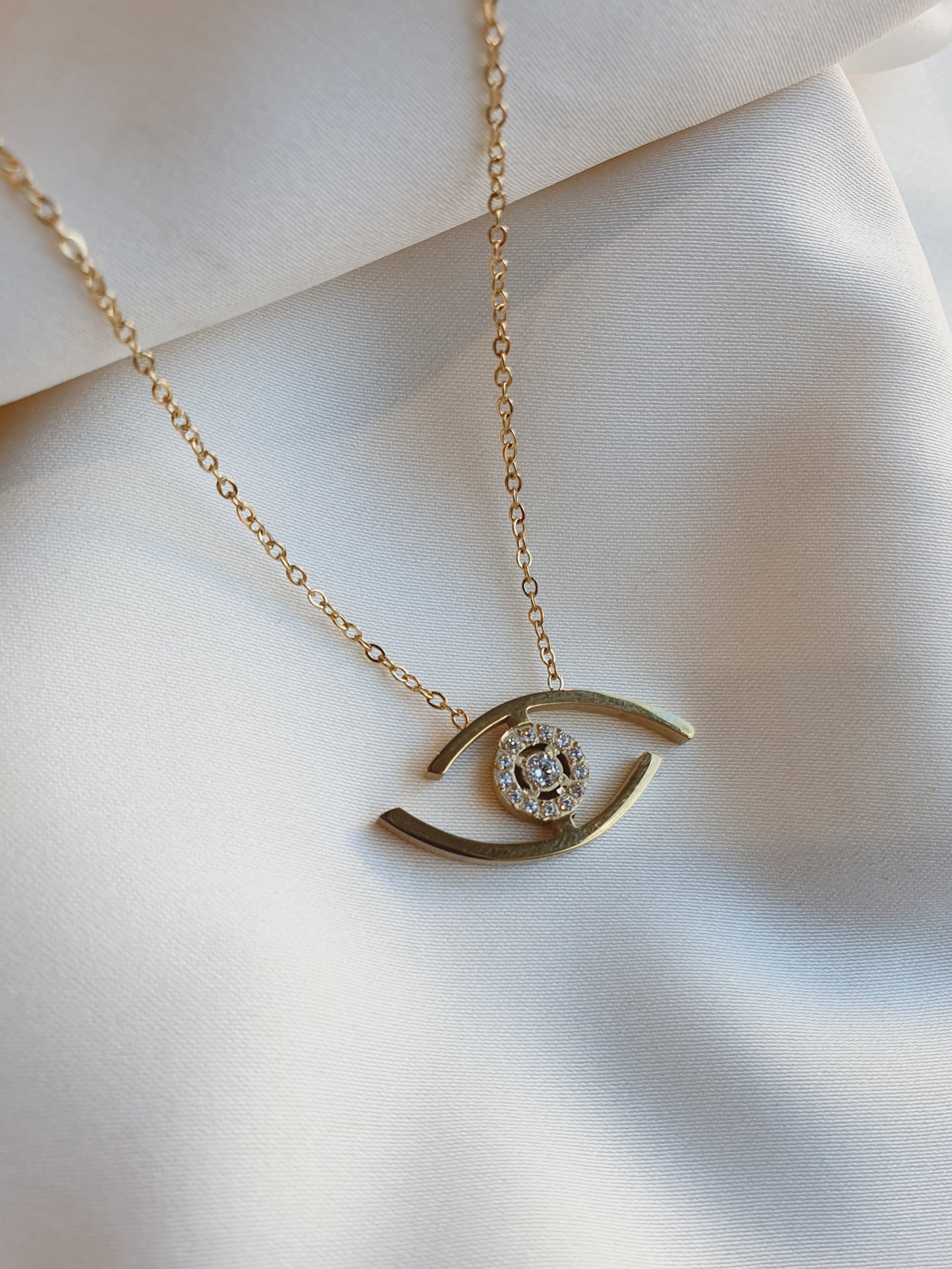Collier oeil et zircons - doré