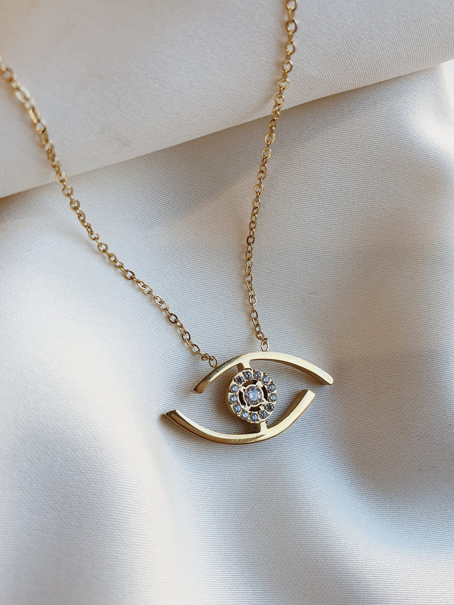 Collier oeil et zircons - doré