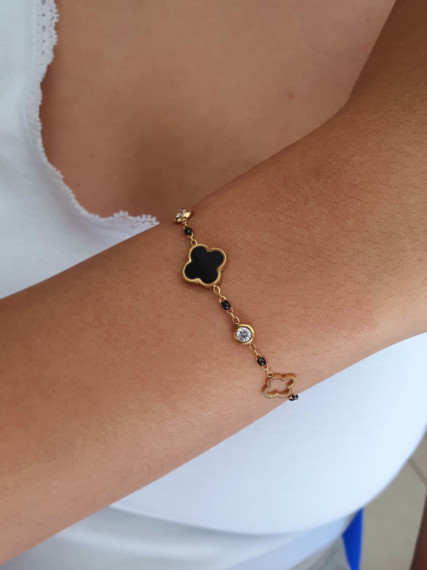 Bracelet trèfle & zircons - doré/noir