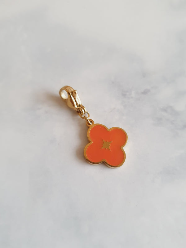 Charm trèfle orangé - doré