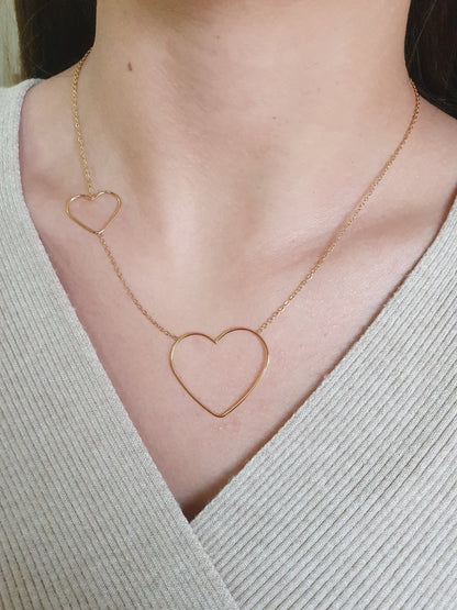Collier duo de cœurs - doré