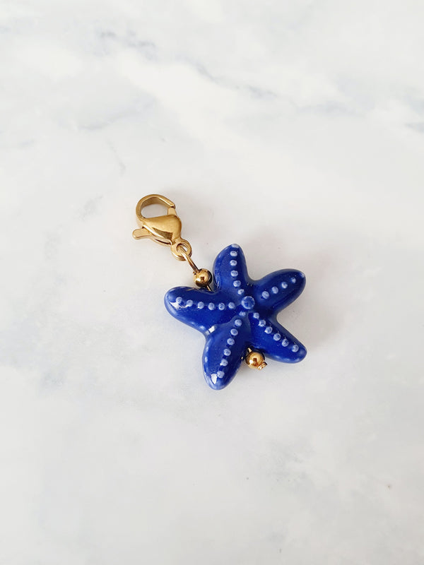 Charm étoile de mer bleue - doré