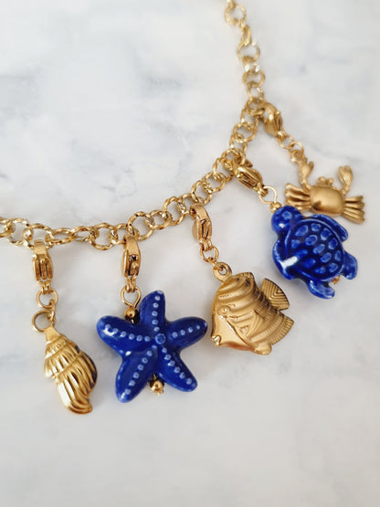 Charm tortue bleue - doré