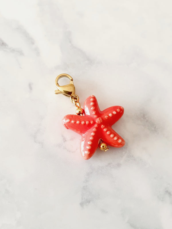 Charm étoile de mer rouge - doré