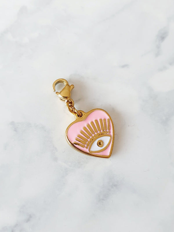 Charm coeur oeil rose vif - doré