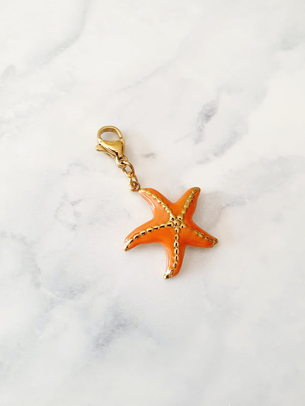Charm étoile de mer texturée orange - doré