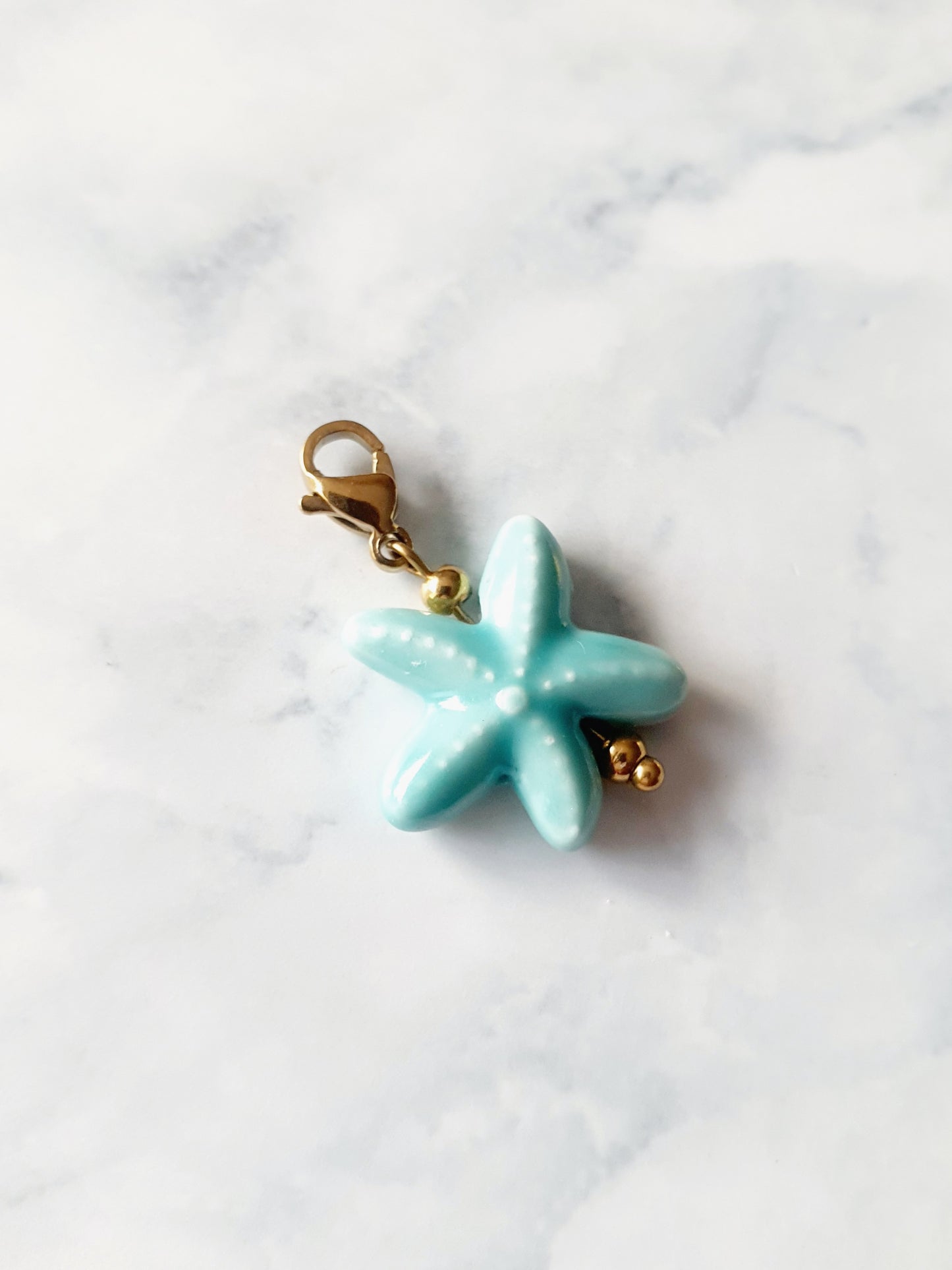 Charm étoile de mer - doré | vert d'eau