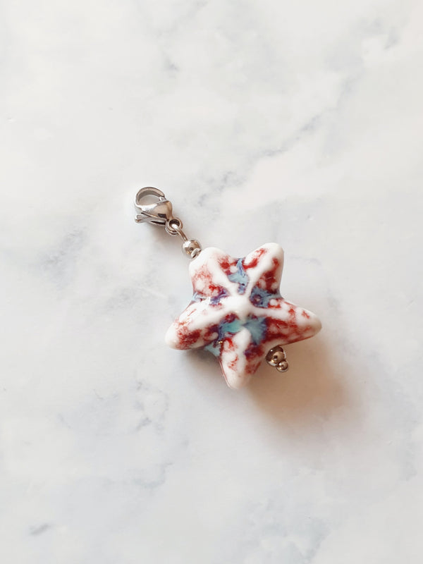 Charm Étoile de Rivage - argenté | Blanc corail