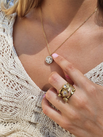 Collier rotatif anti-stress RONDE DE FLEURS - Doré