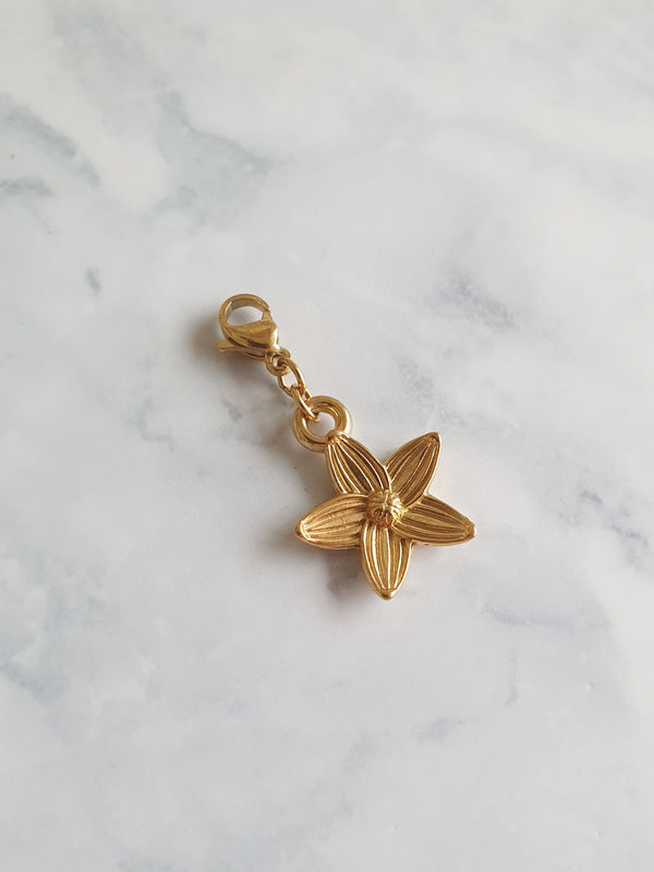 Charm fleur stylisée - doré