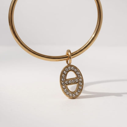 Jonc breloque maille marine zircons – doré