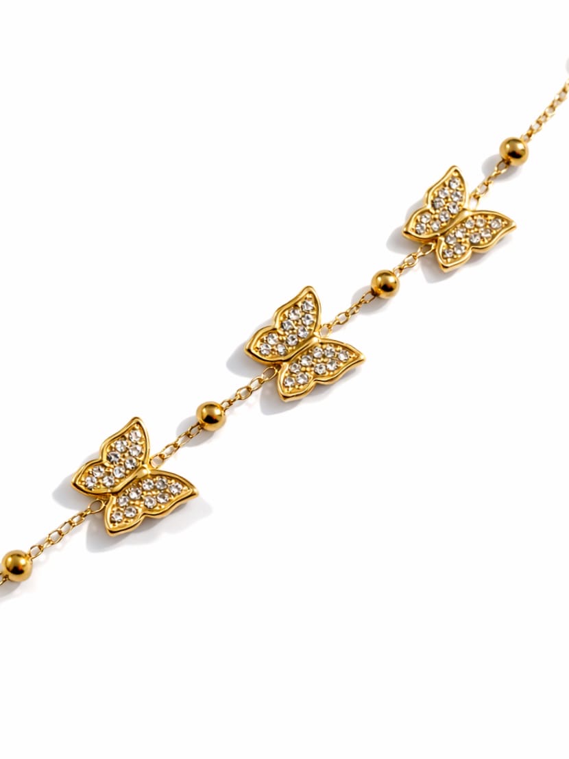 Bracelet papillons strass - doré