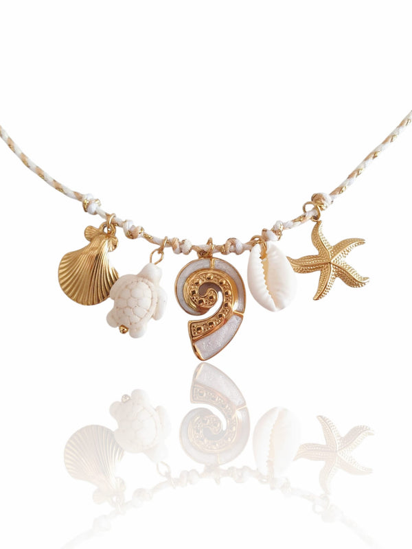 Bracelet cordon breloques marine blanche - doré