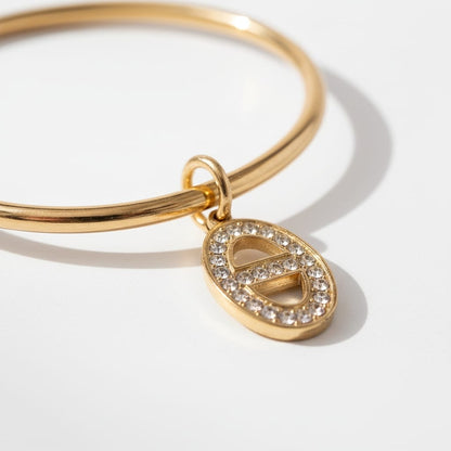 Jonc breloque maille marine zircons – doré
