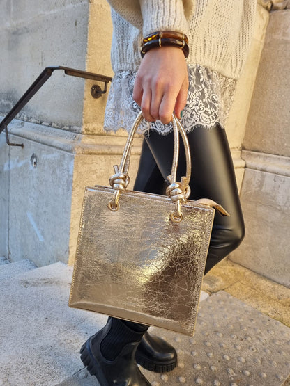 Sac rigide doré effet marbré