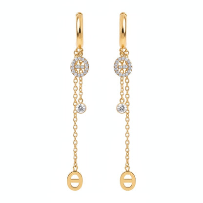 Boucles d'oreilles pendantes maille marine et zircons - doré