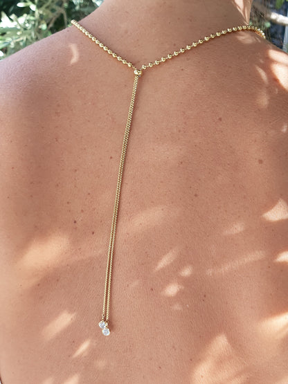 Bijou de dos PERLESIA