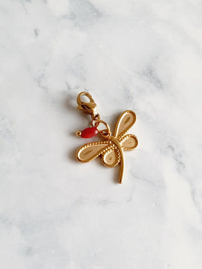 Charm libellule perle rouge - doré