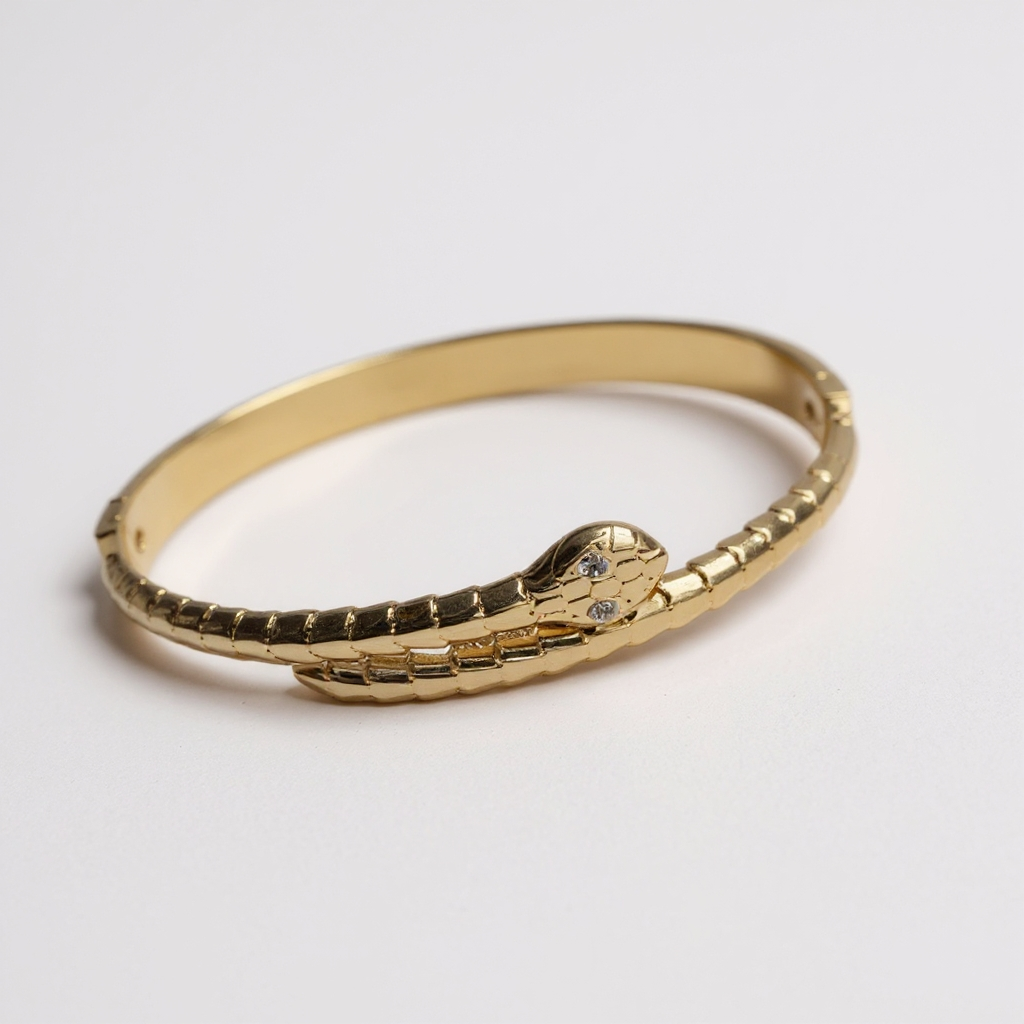 Jonc serpent yeux zircons - doré