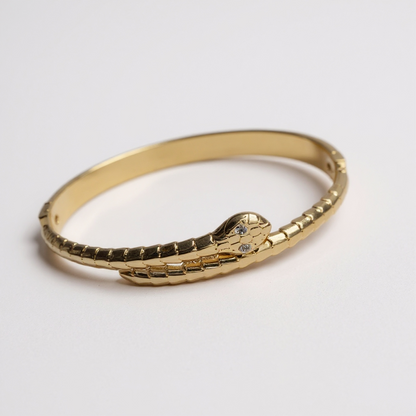 Jonc serpent yeux zircons - doré