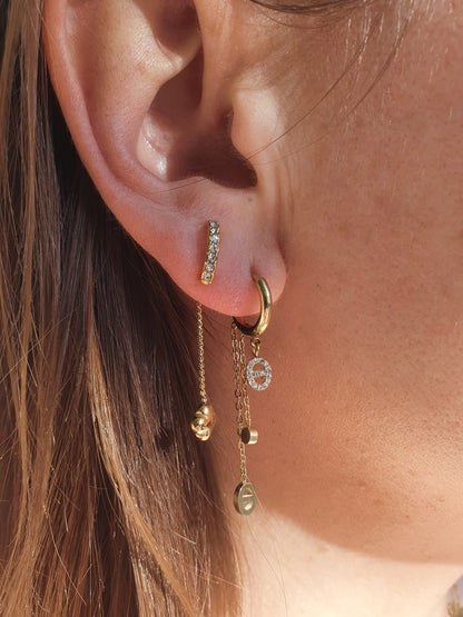 Boucles d'oreilles pendantes maille marine et zircons - doré