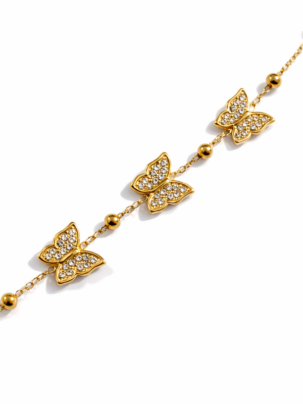 Bracelet papillons strass - doré