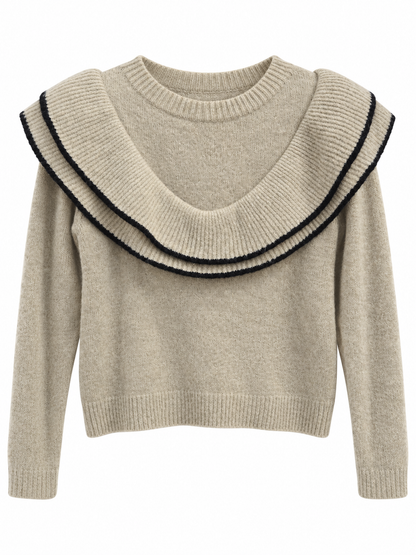 Pull beige à double volant liseré noir