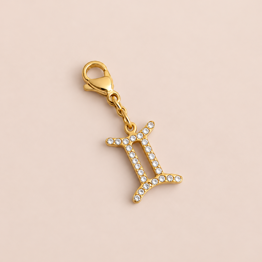 Charm signe astrologique zircons - doré