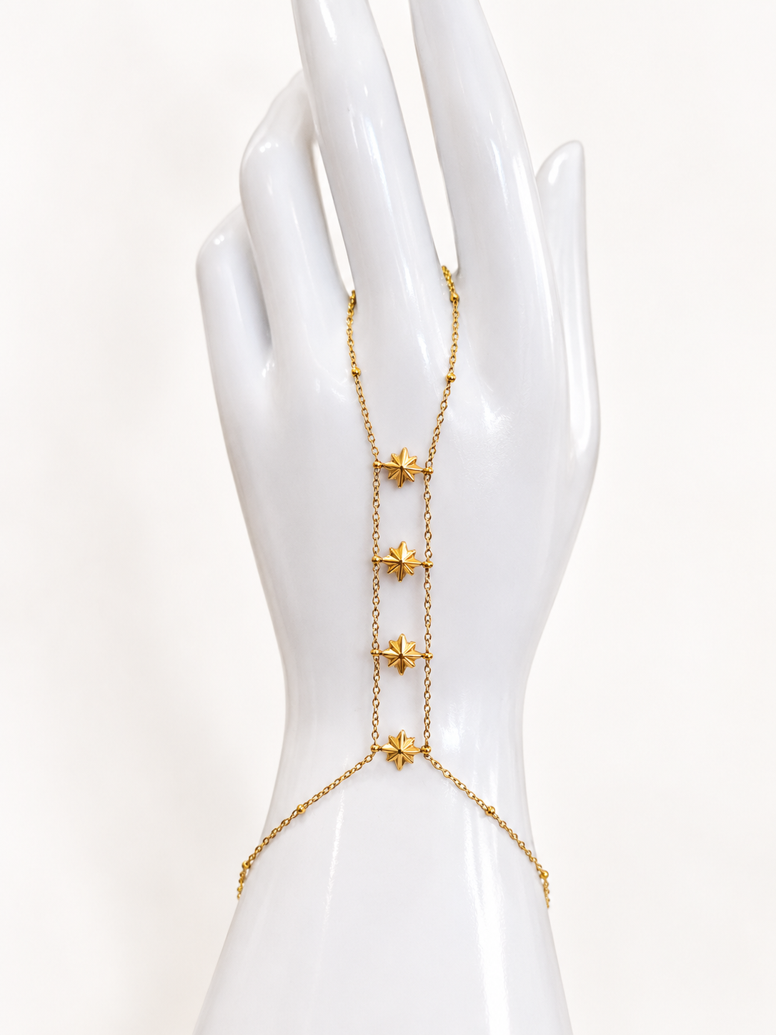 Bracelet de main fleurs dorées et perles roses