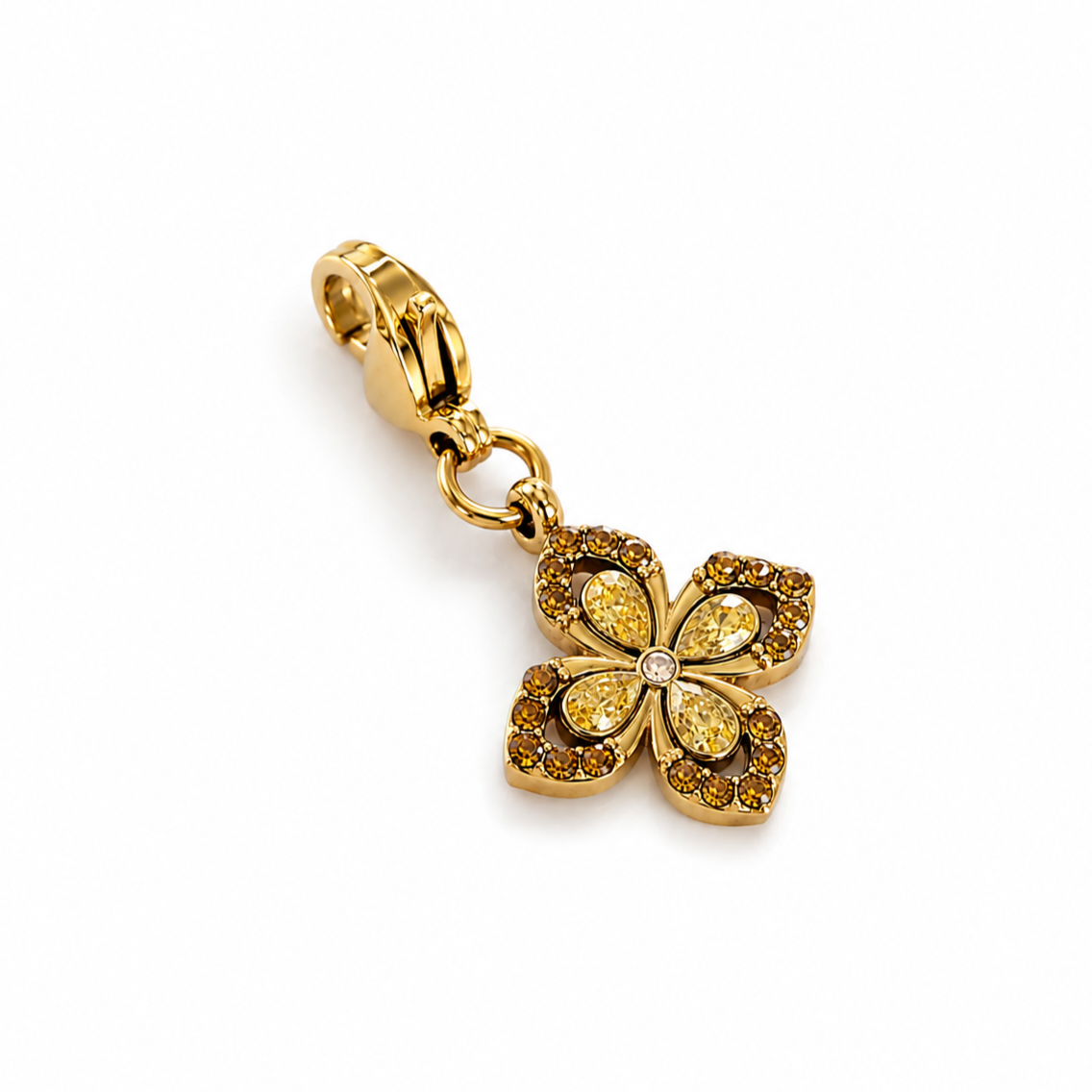 Charm fleur stylisée zircons - jaune
