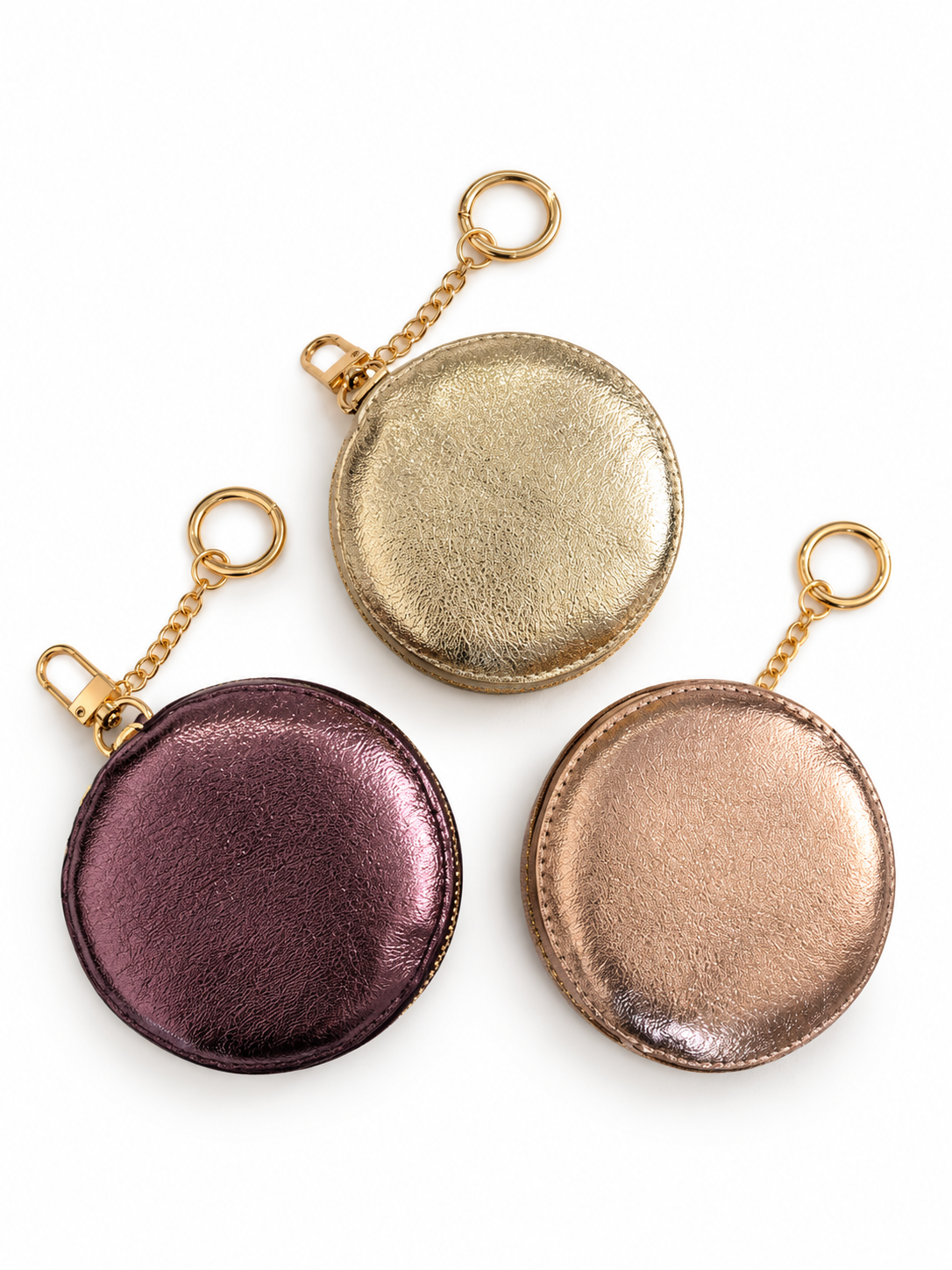 Trio de porte-monnaie porte-clés ronds en cuir italien métallisé doré, bronze rosé et prune