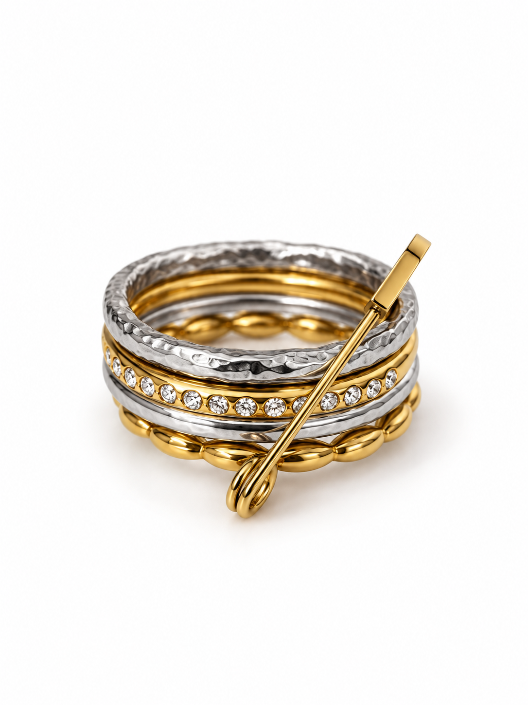 Bague multi-anneaux dorés et argentés avec épingle, vue de face