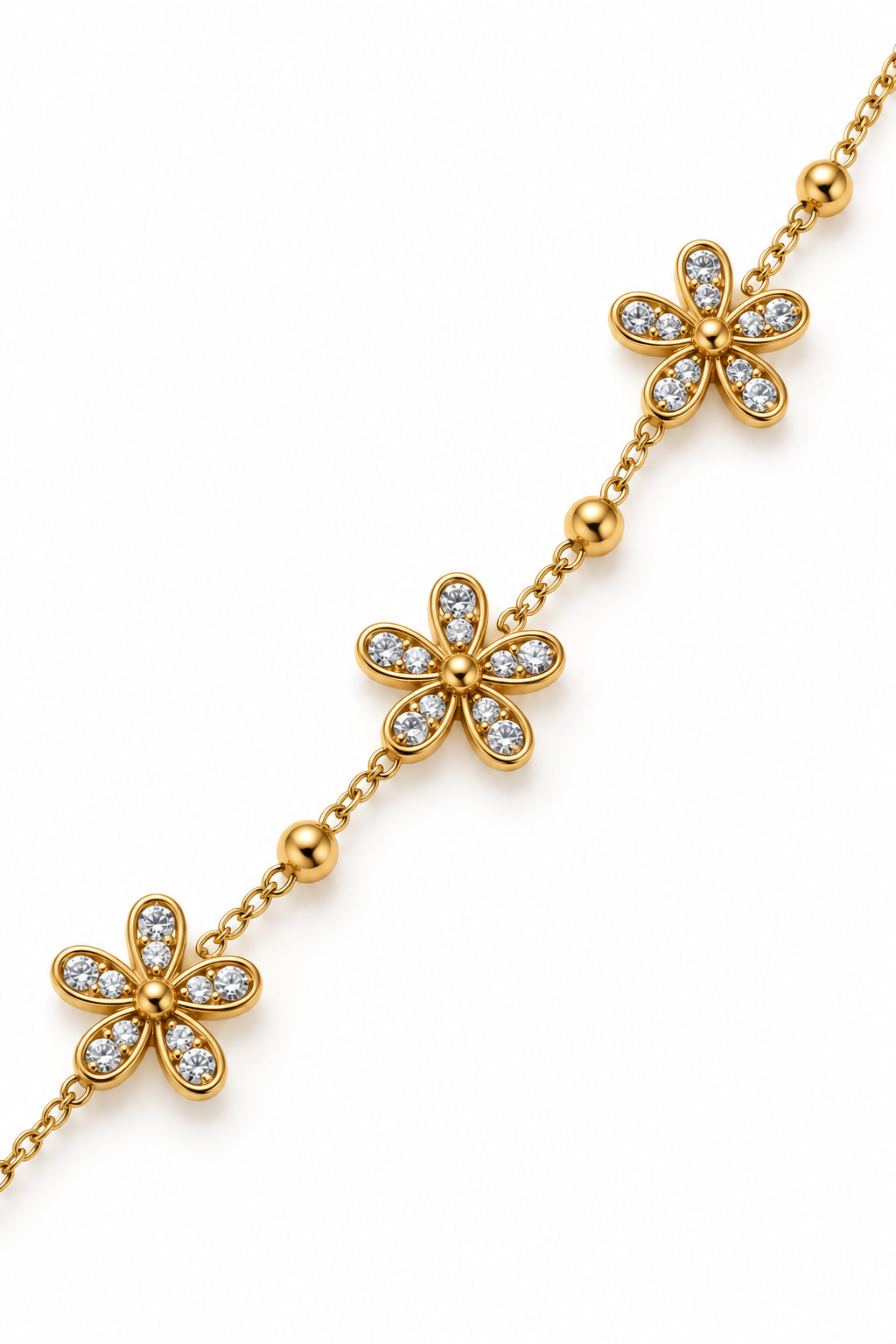 Bracelet doré trois fleurs en zircons