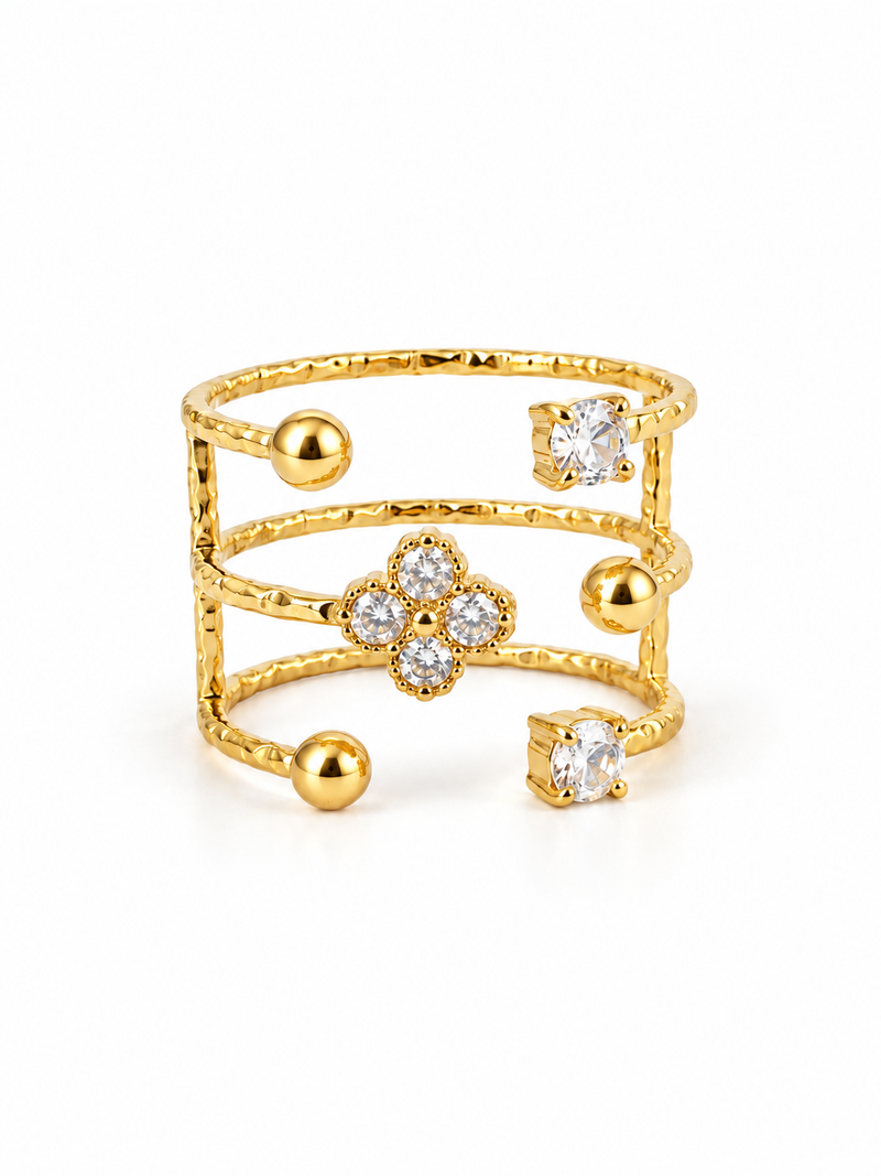 Bague TALIVEA : trois anneaux martelés avec trèfle de zircons