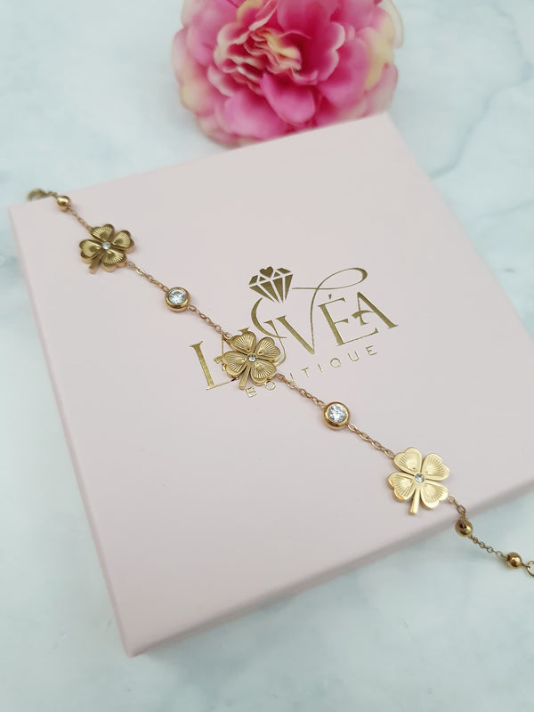 Bracelet petits trèfles à tiges et zircons - doré