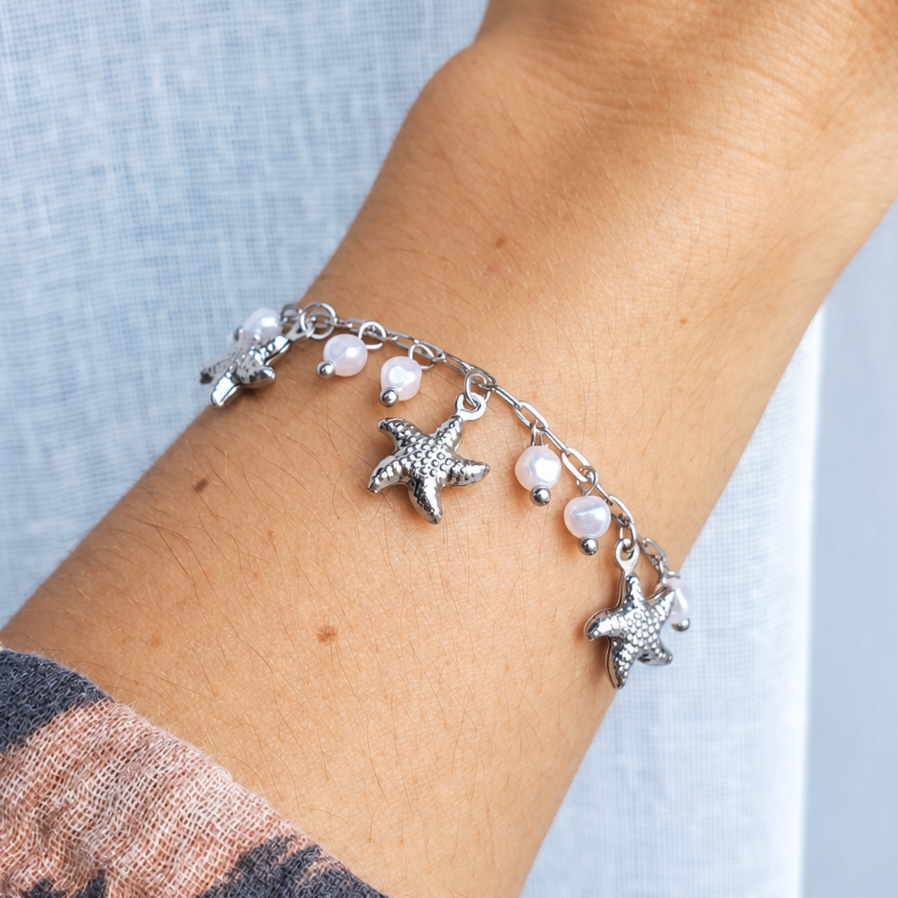 Bracelet breloques étoiles de mer et perles - argenté