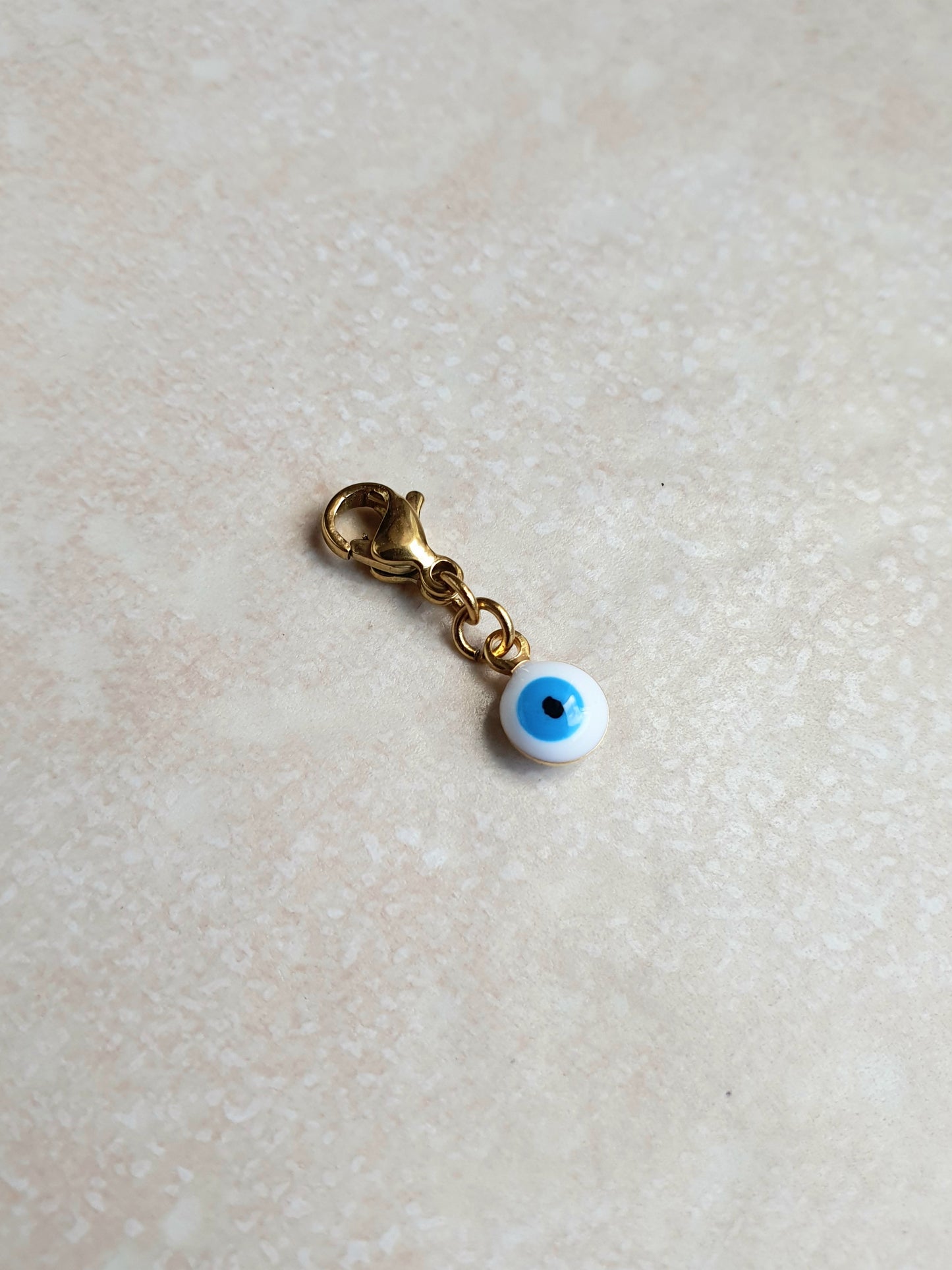 Charm oeil turc blanc - doré