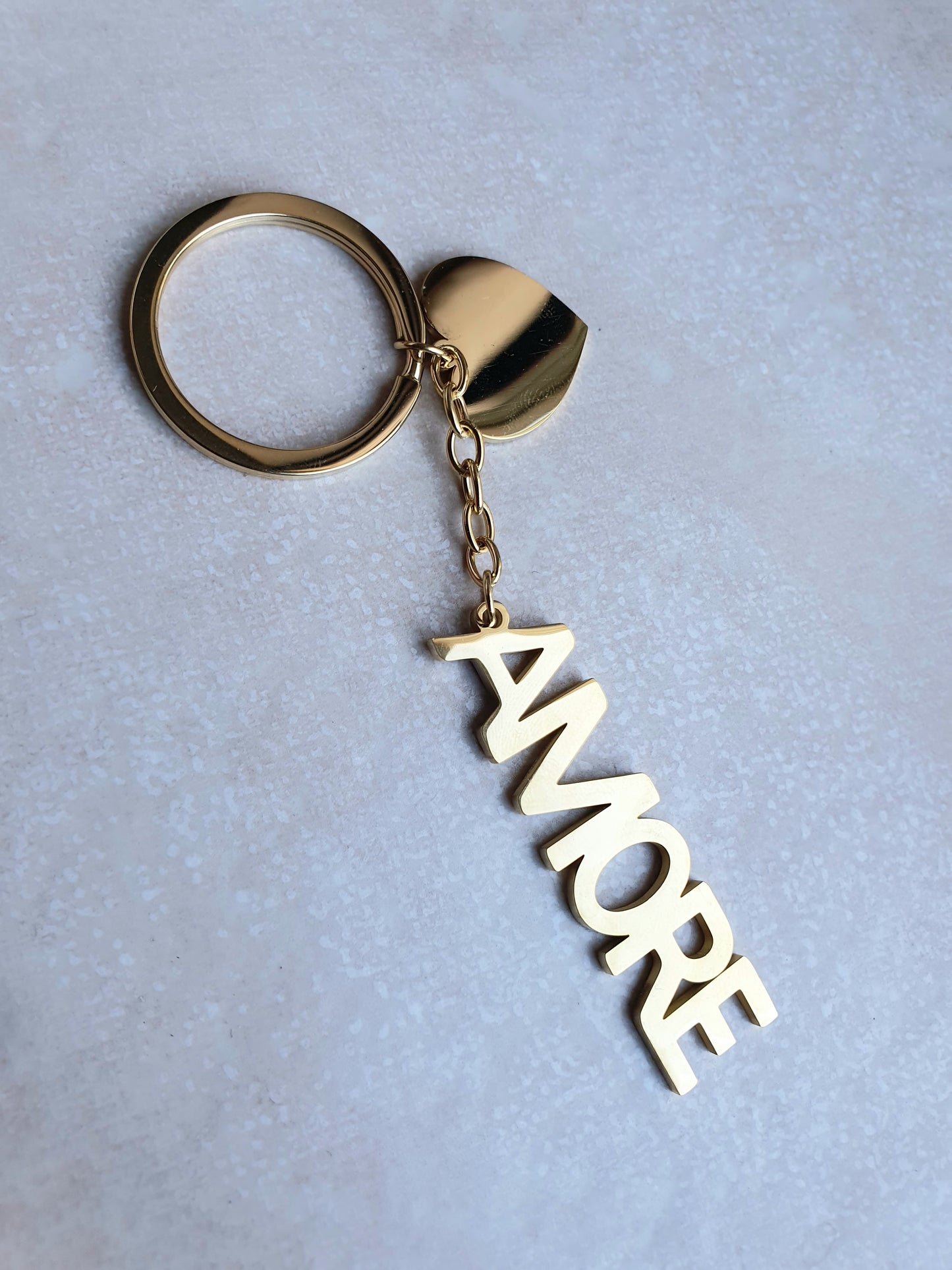 Porte-clés AMORE en acier doré