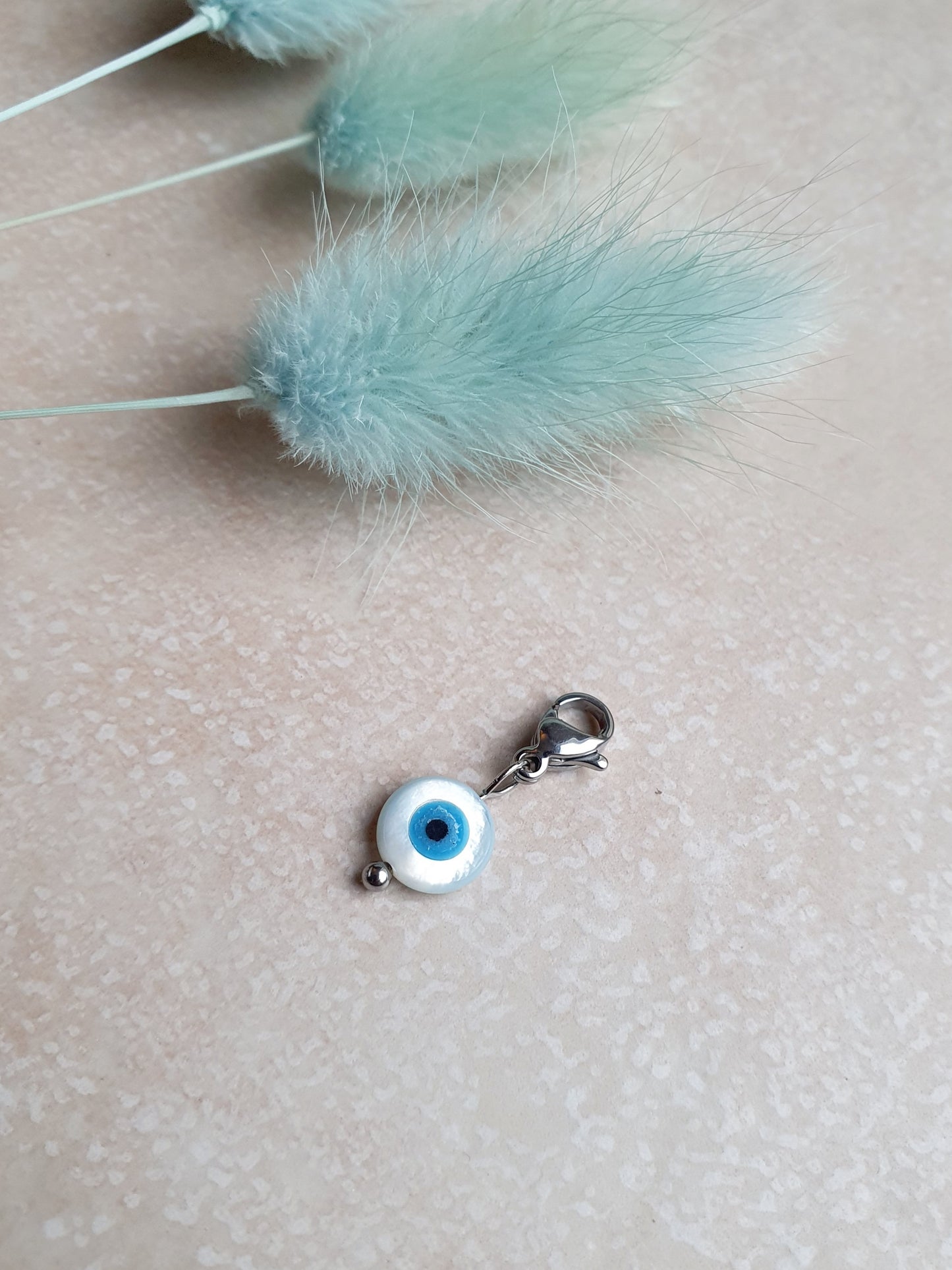 Charm oeil en nacre - argenté